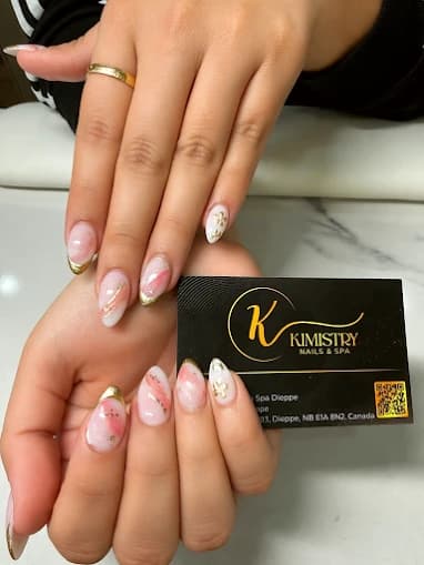 Almond nails with French tips and hand-painted floral art