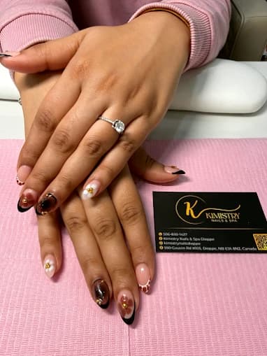 Black and nude set with gold detailing and marble accent nails