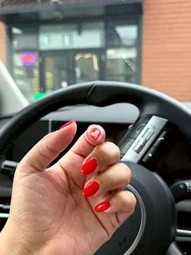 A long, glossy cherry-red set